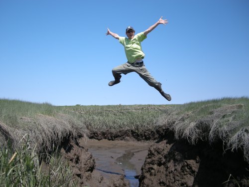 An intern leaps for joy on the TIDE Project. Photo: DS Johnson